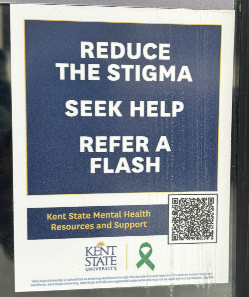 Mental health flyer on door at Taylor Hall. 